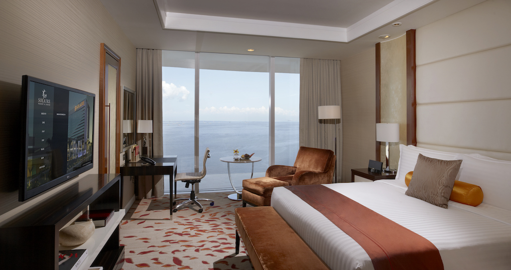 Treat your dad to a staycation in a Solaire Deluxe Room.